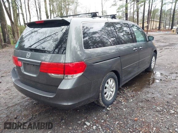 2010 Honda Odyssey EX-L with VIN 5FNRL3H75AB021480, listed as a IAAI auction lot 41793994 with 169,386 mi miles and . Bid and sale history available at DreamBid. Image 4.