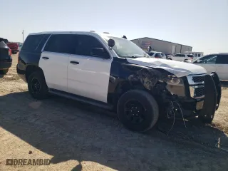 2016 Chevrolet Tahoe Commercial with VIN 1GNLCDEC2GR136559, listed as a Copart auction lot 51077695 with 123,968 mi miles and Salvage Title. Bid and sale history available at carsss.com. Image 4.