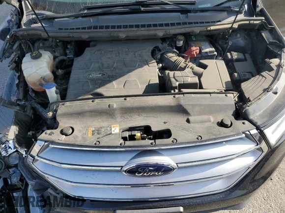 2015 Ford Edge SE with VIN 2FMTK3G86FBC34683, listed as a Copart auction lot 63339425 with 116,973 mi miles and Salvage title. Bid and sale history available at DreamBid. Image 12.