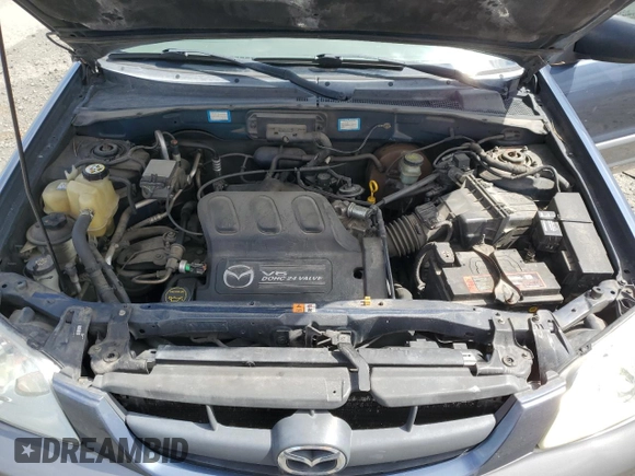 2001 Mazda Tribute LX with VIN 4F2CU08101KM29823, listed as a Copart auction lot 53857145 with 187,710 mi miles and Salvage Title. Bid and sale history available at carsss.com. Image 12.
