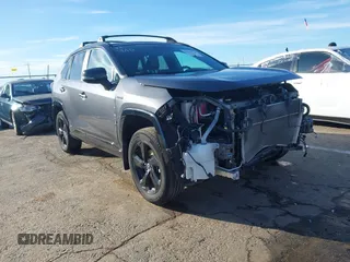 2021 Toyota RAV4 Hybrid XSE with VIN 2T3E6RFV0MW003784, listed as a IAAI auction lot 41522721 with 57,337 mi miles and . Bid and sale history available at DreamBid. Image 1.