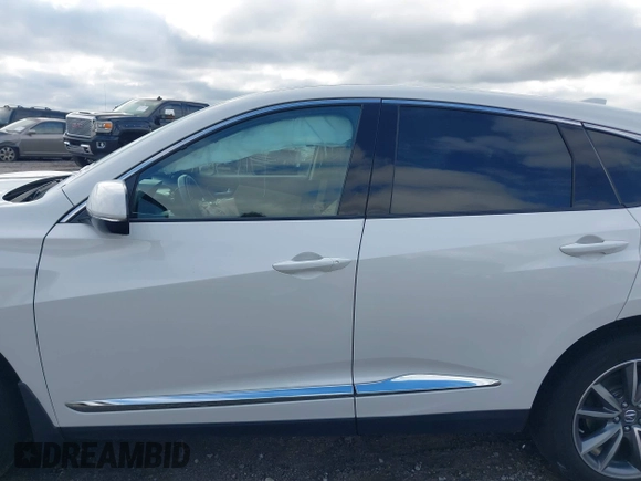 2020 Acura RDX Advance with VIN 5J8TC2H79LL033018, listed as a IAAI auction lot 42331295 with 53,015 mi miles and . Bid and sale history available at DreamBid. Image 14.