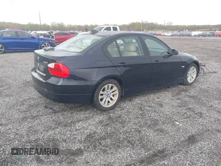 2006 BMW 3 Series 325i with VIN WBAVB13536KX37524, listed as a IAAI auction lot 42040781 with 123,020 mi miles. Bid and sale history available at carsss.com. Image 4.