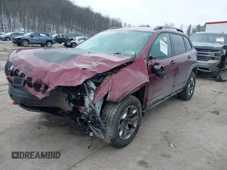 2019 Jeep Cherokee Trailhawk with VIN 1C4PJMBX1KD314149, listed as a IAAI auction lot 40929910 with 77,000 mi miles and . Bid and sale history available at DreamBid. Image 2.