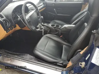 1996 Mazda MX-5 Miata z VIN JM1NA3531T0718068, wystawiony jako Copart lot #56614065 z przebiegiem 116 486 mil mil oraz Szkody całkowita. Historia ofert i sprzedaży dostępna na DreamBid. Obrazek 7.
