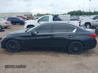2015 Infiniti Q50 Sport z VIN JN1BV7AP7FM334447, wystawiony jako IAAI lot #42595908 z przebiegiem 168 214 mil mil oraz . Historia ofert i sprzedaży dostępna na DreamBid. Obrazek 14.