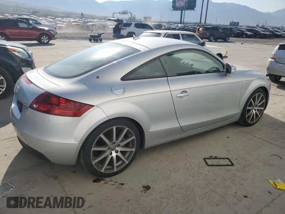 2009 Audi TT z VIN TRUKF38J391020407, wystawiony jako Copart lot #62101664 z przebiegiem 91 585 mil mil oraz Szkoda całkowita • Salvage title. Historia ofert i sprzedaży dostępna na DreamBid. Obrazek 3.