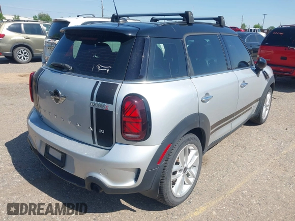 2014 MINI Countryman S with VIN WMWZC5C52EWP36667, listed as a IAAI auction lot 42541120 with 149,331 mi miles and . Bid and sale history available at DreamBid. Image 4.