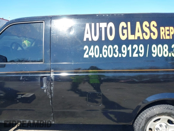 2004 Chevrolet Astro Cargo with VIN 1GCDM19X04B123352, listed as a IAAI auction lot 41879842 with 197,916 mi miles. Bid and sale history available at carsss.com. Image 14.