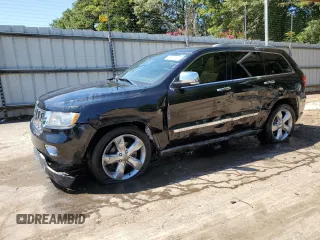 2012 Jeep Grand Cherokee Overland with VIN 1C4RJECTXCC227769, listed as a Copart auction lot 68760174 with 144,537 mi miles and Salvage Title. Bid and sale history available at carsss.com. Image 1.
