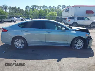 2014 Ford Fusion SE Hybrid with VIN 3FA6P0LU3ER373311, listed as a IAAI auction lot 42048513 with 155,935 mi miles. Bid and sale history available at carsss.com. Image 13.