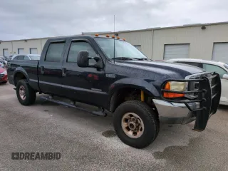 2000 Ford Super Duty F-250 XL with VIN 1FTNW21FXYEC96890, listed as a Copart auction lot 74687394 with Not Provided miles and Salvage Title. Bid and sale history available at carsss.com. Image 4.
