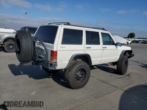 1996 Jeep Cherokee SE z VIN 1J4FJ28S7TL270218, wystawiony jako Copart lot #55302885 z przebiegiem 239 209 mil mil oraz Szkoda całkowita • Salvage title. Historia ofert i sprzedaży dostępna na DreamBid. Obrazek 3.