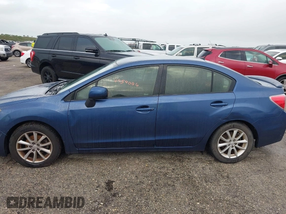 2013 Subaru Impreza Premium z VIN JF1GJAB66DH003999, wystawiony jako IAAI lot #40540006 z przebiegiem Nie podano mil oraz . Historia ofert i sprzedaży dostępna na DreamBid. Obrazek 14.