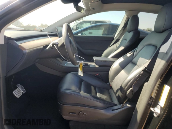2022 Tesla Model Y Performance with VIN 7SAYGDEF1NF486218, listed as a Copart auction lot 63127435 with 99,302 mi miles and Salvage title. Bid and sale history available at DreamBid. Image 7.