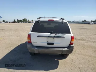 1999 Jeep Grand Cherokee Laredo с VIN 1J4G258S8XC735159, выставлен на аукционе Copart как лот 56247505 с пробегом 241 636 миль миль и Списание • Salvage title. История ставок и продаж доступна на DreamBid. Изображение 6.