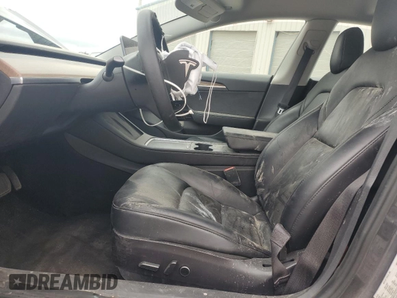 2022 Tesla Model 3 with VIN 5YJ3E1EA4NF371483, listed as a Copart auction lot 49287665 with 59,476 mi miles and Salvage Title. Bid and sale history available at DreamBid. Image 7.