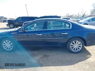 2009 Buick Lucerne CXL with VIN 1G4HD57M09U135641, listed as a IAAI auction lot 41823615 with 107,479 mi miles and . Bid and sale history available at DreamBid. Image 14.