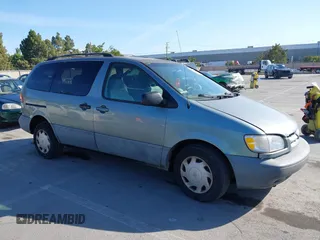 1999 Toyota Sienna LE z VIN 4T3ZF13C0XU117228, wystawiony jako IAAI lot #42384745 z przebiegiem 292 487 mil mil oraz . Historia ofert i sprzedaży dostępna na DreamBid. Obrazek 1.