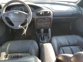 1998 Chrysler Cirrus LXi z VIN 1C3EJ56H4WN236597, wystawiony jako Copart lot #79936954 z przebiegiem 118 555 mil mil oraz Szkody całkowita. Historia ofert i sprzedaży dostępna na DreamBid. Obrazek 8.