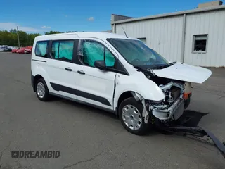 2018 Ford Transit Connect XL with VIN NM0GS9E78J1353985, listed as a IAAI auction lot 39189140 with 9,033 mi miles and . Bid and sale history available at DreamBid. Image 1.