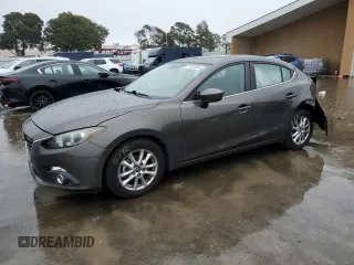 2014 Mazda 3 i Grand Touring with VIN JM1BM1W75E1199863, listed as a Copart auction lot 85233304 with 90,988 mi miles and Salvage Title. Bid and sale history available at carsss.com. Image 1.