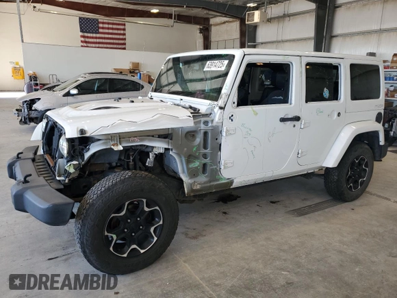 2015 Jeep Wrangler Unlimited Sahara with VIN 1C4BJWEG2FL620001, listed as a Copart auction lot 63914725 with 114,810 mi miles and Salvage title. Bid and sale history available at DreamBid. Image 1.