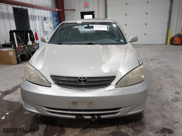 2004 Toyota Camry LE with VIN 4T1BF32K74U568974, listed as a IAAI auction lot 41590644 with 129,461 mi miles. Bid and sale history available at carsss.com. Image 12.