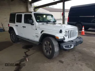 2018 Jeep Wrangler Unlimited Sahara z VIN 1C4HJXEG3JW116404, wystawiony jako IAAI lot #42152506 z przebiegiem 57 727 mil mil oraz . Historia ofert i sprzedaży dostępna na DreamBid. Obrazek 1.