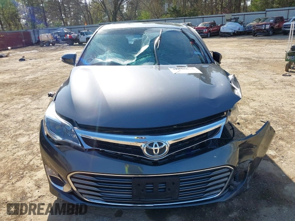 2014 Toyota Avalon Limited z VIN 4T1BK1EB9EU107787, wystawiony jako IAAI lot #41826625 z przebiegiem 78 718 mil mil oraz . Historia ofert i sprzedaży dostępna na DreamBid. Obrazek 18.