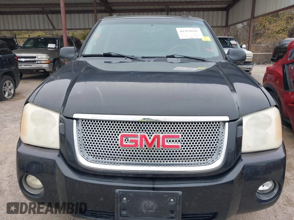 2008 GMC Envoy Denali with VIN 1GKES63M182191403, listed as a IAAI auction lot 41499601 with 217,071 mi miles. Bid and sale history available at carsss.com. Image 6.