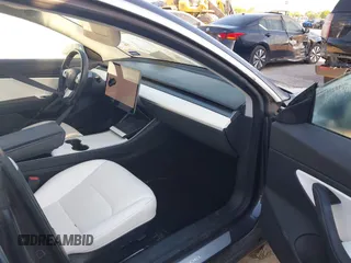 2018 Tesla Model 3 Long Range Battery with VIN 5YJ3E1EB0JF170215, listed as a IAAI auction lot 41969004 with 81,704 mi miles and . Bid and sale history available at DreamBid. Image 5.