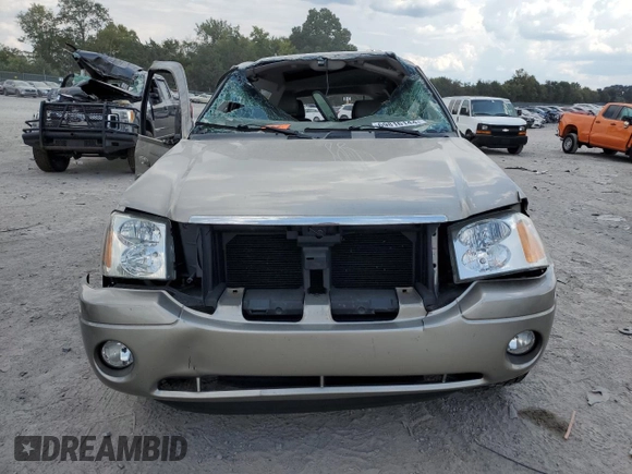 2002 GMC Envoy SLT with VIN 1GKDT13SX22380133, listed as a Copart auction lot 69816144 with 90,060 mi miles and Salvage Title. Bid and sale history available at DreamBid. Image 5.