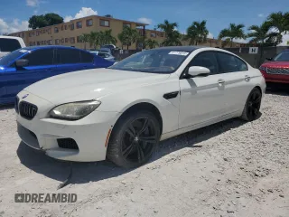 2014 BMW M6 z VIN WBS6C9C55ED467226, wystawiony jako Copart lot #61779015 z przebiegiem Nie podano mil oraz Szkoda całkowita • Salvage title. Historia ofert i sprzedaży dostępna na DreamBid. Obrazek 1.