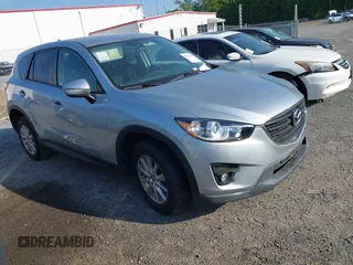 2016 Mazda CX-5 Touring with VIN JM3KE2CY0G0897538, listed as a IAAI auction lot 42137653 with Not Provided miles and . Bid and sale history available at carsss.com. Image 1.