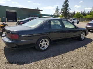 1996 Chevrolet Caprice 1SA Special Value with VIN 1G1BL52P7TR120054, listed as a Copart auction lot 55260005 with 213,627 mi miles and Clean Title. Bid and sale history available at DreamBid. Image 3.