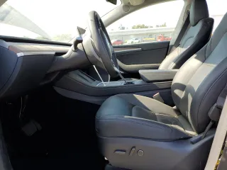 2024 Tesla Model Y Long Range с VIN 7SAYGDEE8RF184146, выставлен на аукционе Copart как лот 61194535 с пробегом 8 225 миль миль и Списание • Salvage title. История ставок и продаж доступна на DreamBid. Изображение 7.