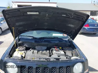 2012 Jeep Patriot Sport with VIN 1C4NJRBB3CD599477, listed as a IAAI auction lot 42147528 with 144,269 mi miles. Bid and sale history available at carsss.com. Image 10.
