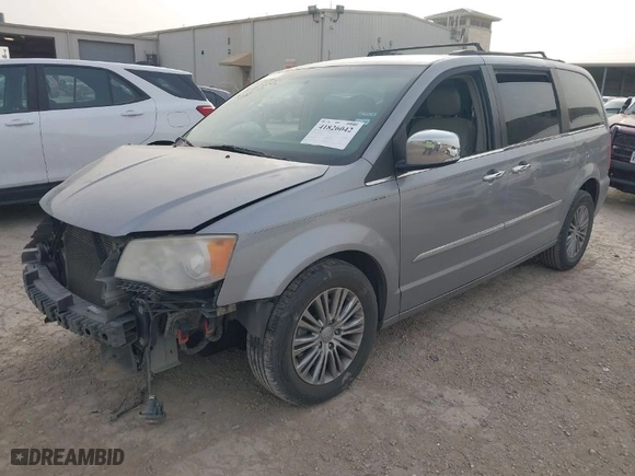 2014 Chrysler Town & Country Touring-L 30th Anniversary with VIN 2C4RC1CGXER454606, listed as a IAAI auction lot 41826042 with 173,300 mi miles. Bid and sale history available at carsss.com. Image 2.