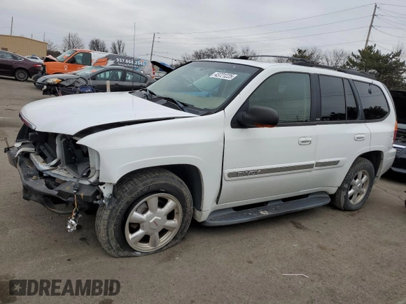 2003 GMC Envoy SLT with VIN 1GKDT13S332293112, listed as a Copart auction lot 43721225 with 139,471 mi miles and Salvage Title. Bid and sale history available at carsss.com. Image 1.