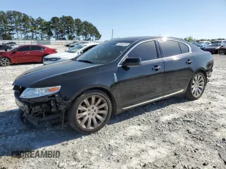2011 Lincoln MKS with VIN 1LNHL9DR7BG615397, listed as a Copart auction lot 52047015 with 111,720 mi miles and Salvage Title. Bid and sale history available at DreamBid. Image 1.