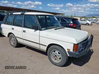 1991 Land Rover Range Rover z VIN SALHV1240MA445261, wystawiony jako IAAI lot #42428768 z przebiegiem 186 327 mil mil oraz . Historia ofert i sprzedaży dostępna na DreamBid. Obrazek 1.