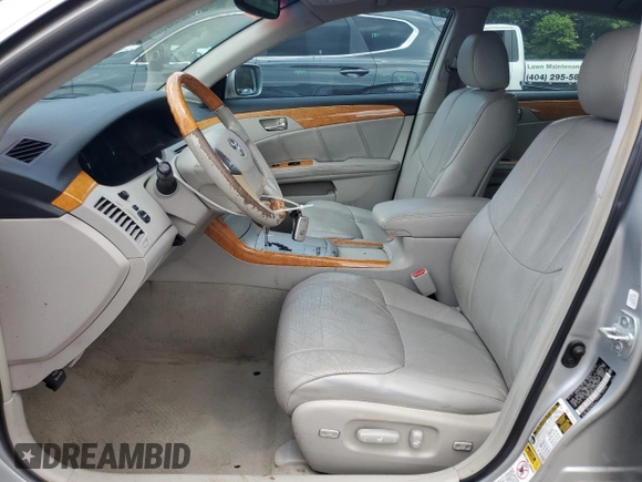 2007 Toyota Avalon XL z VIN 4T1BK36B47U186914, wystawiony jako Copart lot #60364125 z przebiegiem 239 293 mil mil oraz Czysty tytuł • Clean title. Historia ofert i sprzedaży dostępna na DreamBid. Obrazek 7.