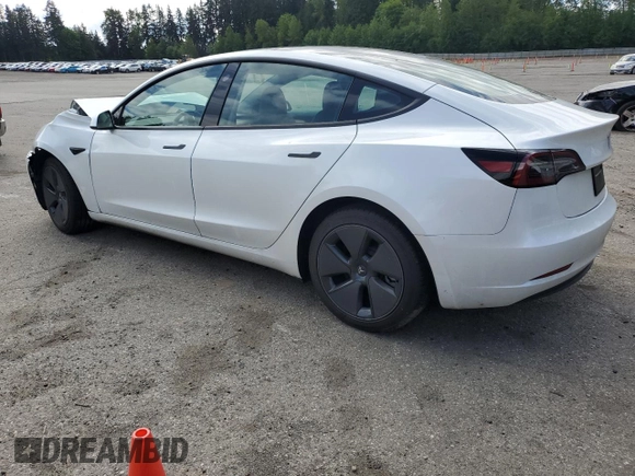 2023 Tesla Model 3 Long Range with VIN 5YJ3E1EB1PF603100, listed as a Copart auction lot 54945865 with 22,865 mi miles and Salvage Title. Bid and sale history available at DreamBid. Image 2.