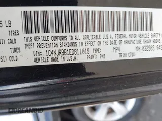 2014 Jeep Patriot Sport with VIN 1C4NJRBB1ED811019, listed as a IAAI auction lot 42181813 with 124,837 mi miles and . Bid and sale history available at DreamBid. Image 9.