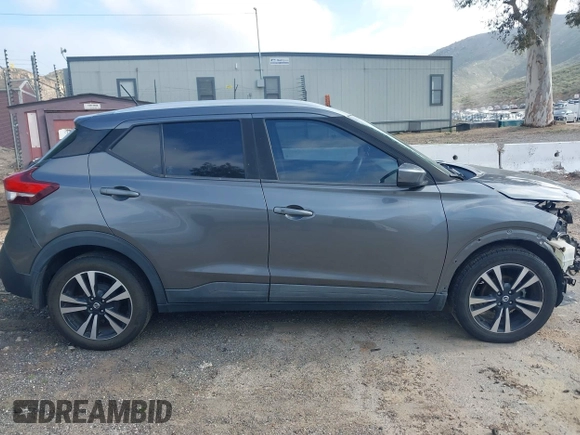 2019 Nissan Kicks SR with VIN 3N1CP5CU9KL483310, listed as a IAAI auction lot 41885087 with 128,055 mi miles. Bid and sale history available at carsss.com. Image 14.