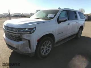 2023 Chevrolet Suburban Premier with VIN 1GNSKFKD7PR542635, listed as a IAAI auction lot 41672529 with 26,409 mi miles. Bid and sale history available at carsss.com. Image 2.