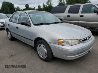 1999 Toyota Corolla VE with VIN 1NXBR12E3XZ153645, listed as a Copart auction lot 61005465 with Not provided miles and Clean title. Bid and sale history available at DreamBid. Image 4.
