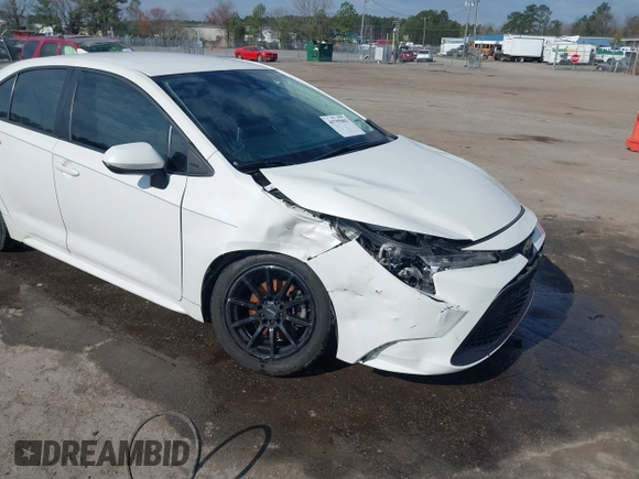 2021 Toyota Corolla LE with VIN 5YFEPMAEXMP160661, listed as a IAAI auction lot 41795003 with 82,470 mi miles and . Bid and sale history available at carsss.com. Image 6.