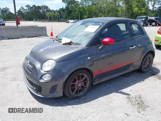 2015 FIAT 500 Abarth with VIN 3C3CFFFH2FT507879, listed as a IAAI auction lot 42135649 with 163,663 mi miles. Bid and sale history available at carsss.com. Image 2.